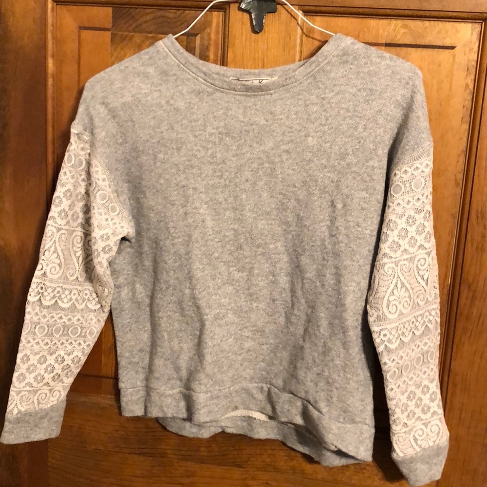 Gray sweater with white lace sleeves